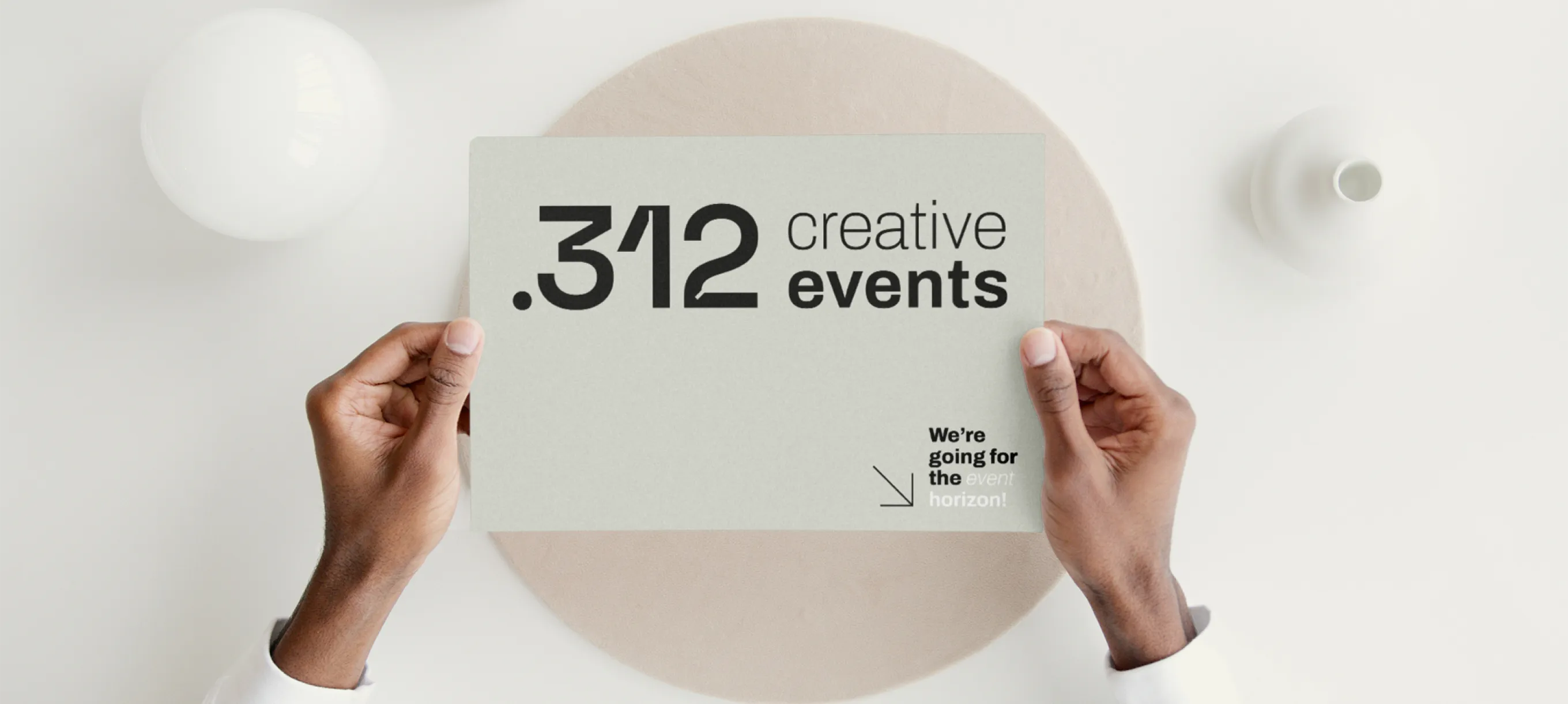 hero image hands holdin card with logo